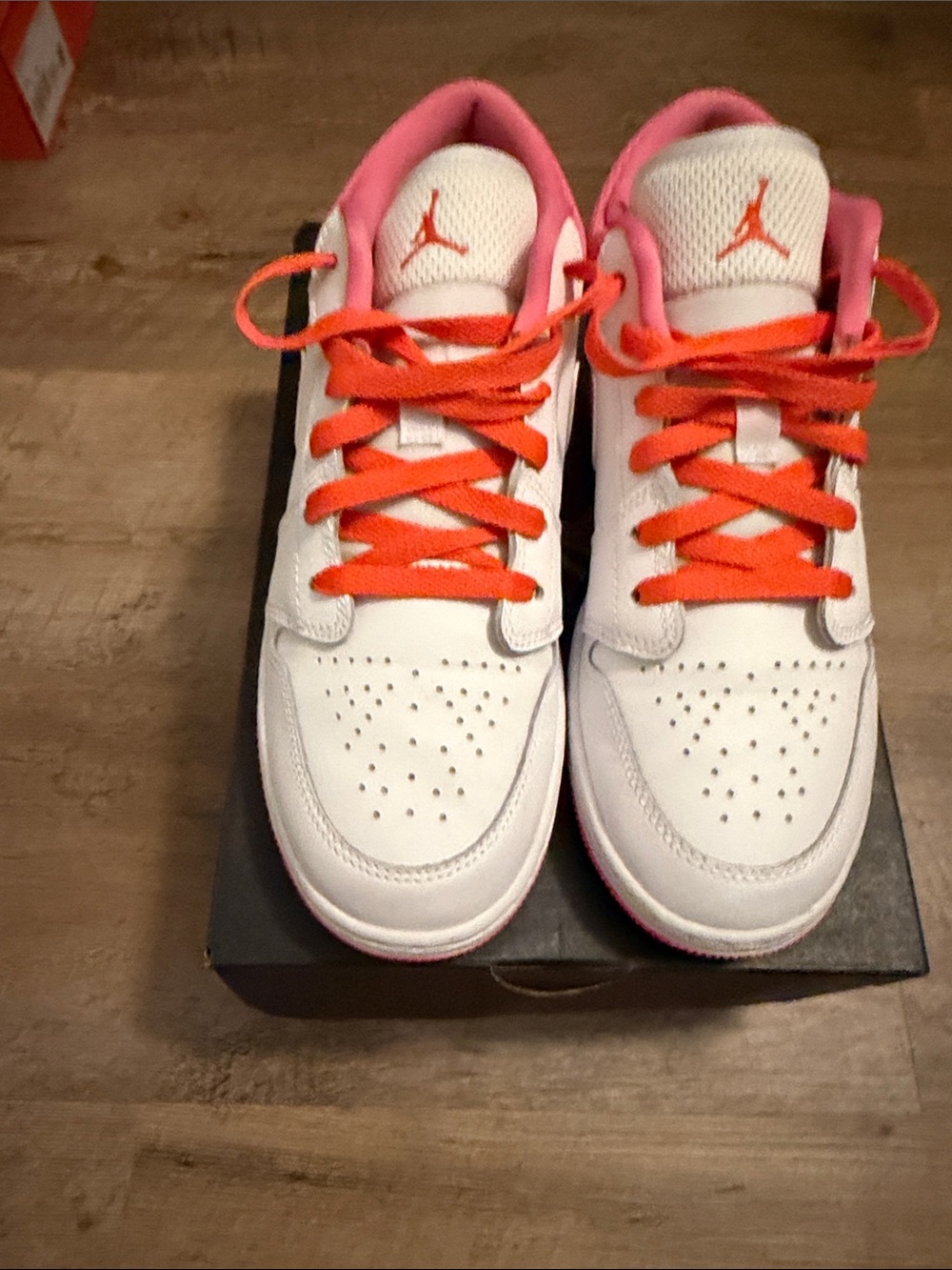 Jordan Youth White Sneakers with Pink Trim and Orange Laces